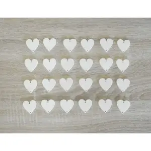 Cut-out heart-shaped embellishments with clean edges for the family calendar