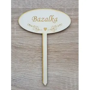 Poke the skewer into the basil leaves