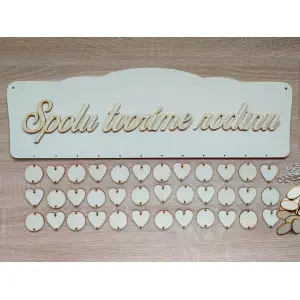 Wooden family calendar type B with the inscription "Together we make a family"
