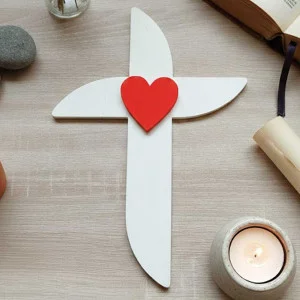 Cross on the wall rounded with a little heart 30cm