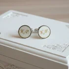 Runde Manschetten mit Initialen