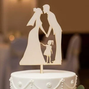 Wooden decoration newlyweds with child