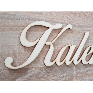 Nápis "Kalendár" s opálenými hranami k rodinnému kalendáru 2