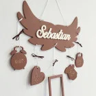 Geschenk für ein Neugeborenes mit Namen auf Flügeln